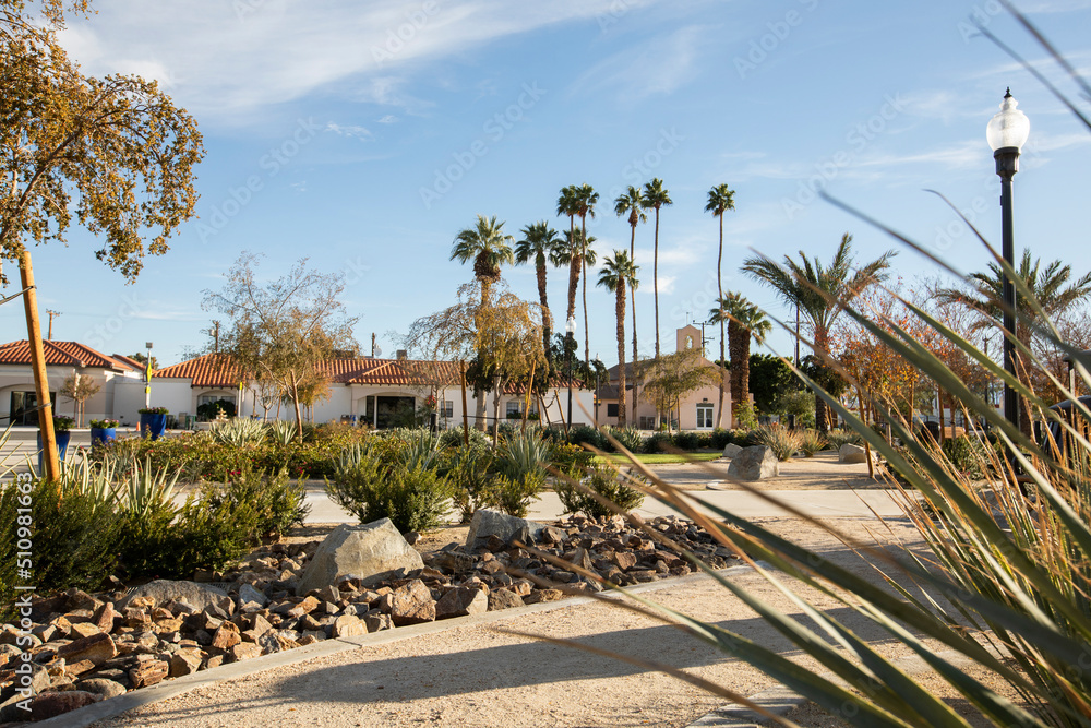 Sunset palm view of historic downtown Coachella, California, USA. - obrazy, fototapety, plakaty 