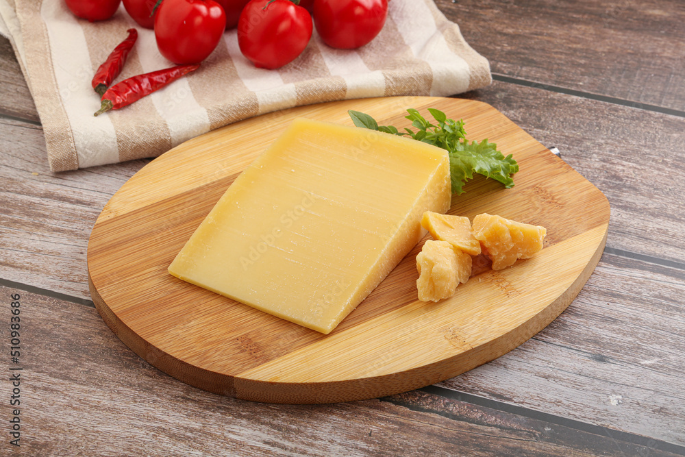 Parmesan hard cheese with small pieces Parmesan hard cheese with small pieces