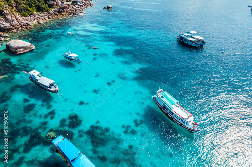 Boats and crystal clear waters at the bay dive site in Koh Tao,diving tour boat © artrachen