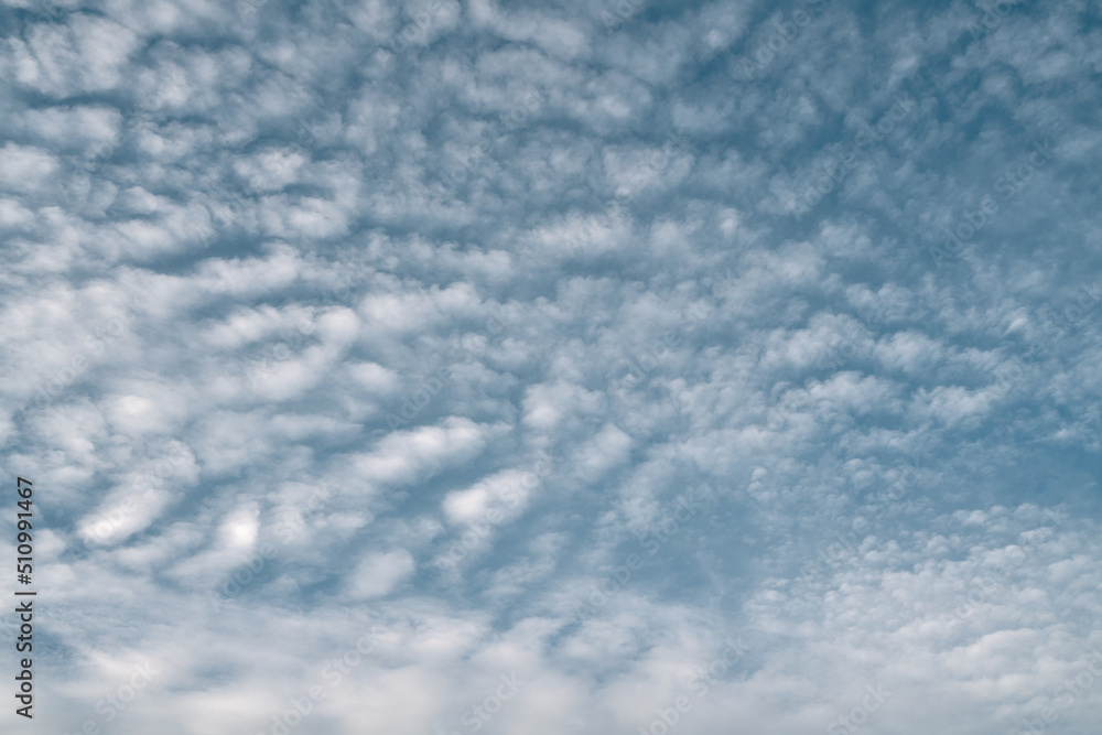 Blue sky with clouds background