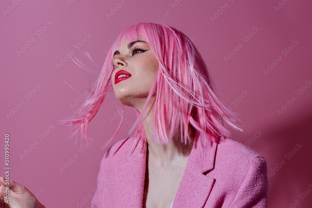 Positive young woman modern style pink hair Red lips fashion color background unaltered Positive young woman modern style pink hair Red lips fashion color background unaltered