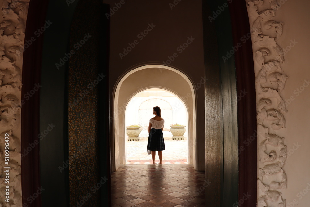 silhouette of a person in a doorway