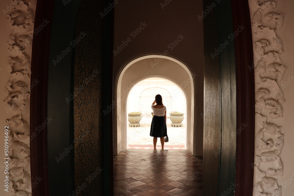 silhouette of a person in a doorway