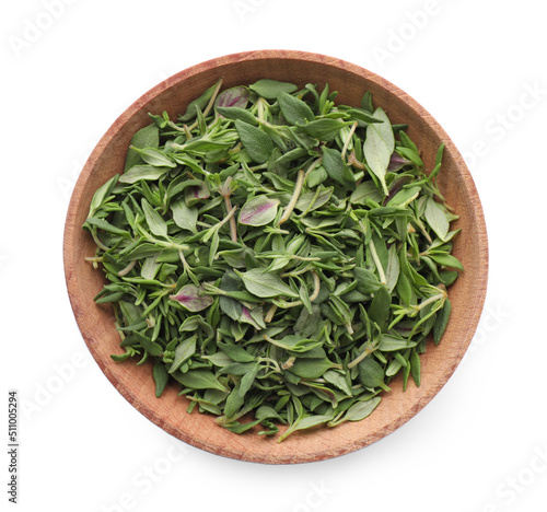 Wooden bowl of fresh green thyme leaves on white background, top view