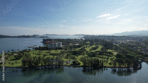 Kota Kinabalu, Sabah Malaysia – June 15, 2022: The Tanjung Aru Beach, Fisherman Village and Shangri-La Hotel