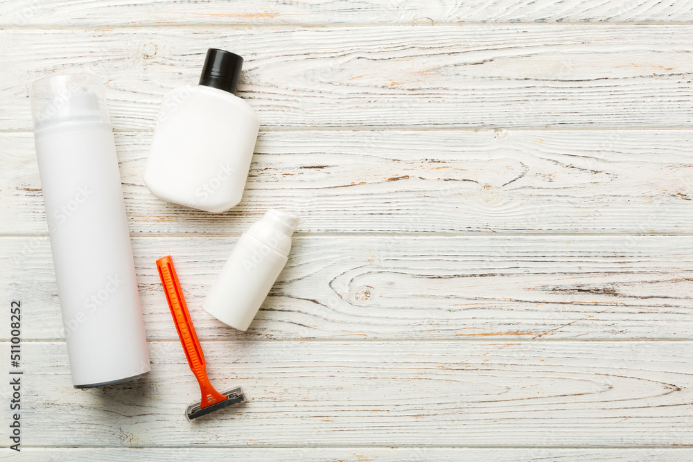 shaving man set. shaving machine, towel, lotion and shaving foam on colored background. Men bath Accessories top view shaving man set. shaving machine, towel, lotion and shaving foam on colored background. Men bath Accessories top view