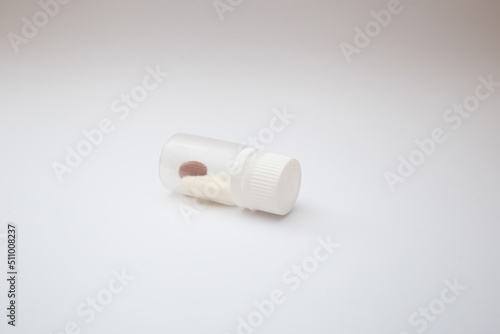 Pills with the badas, dietary supplement on a white background