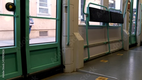 interior of an empty tram traveling