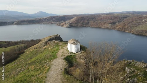 Aerial view of church of Saint John the Baptist and Pchelina Reservoir, Pernik Region, Bulgaria photo