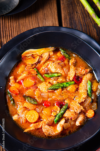 colorful turkey fricassee with asparagus and paprika