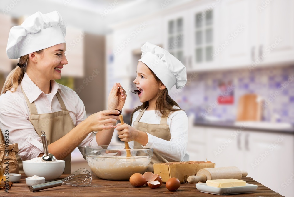 Happy young family eating in the room Happy young family eating in the room