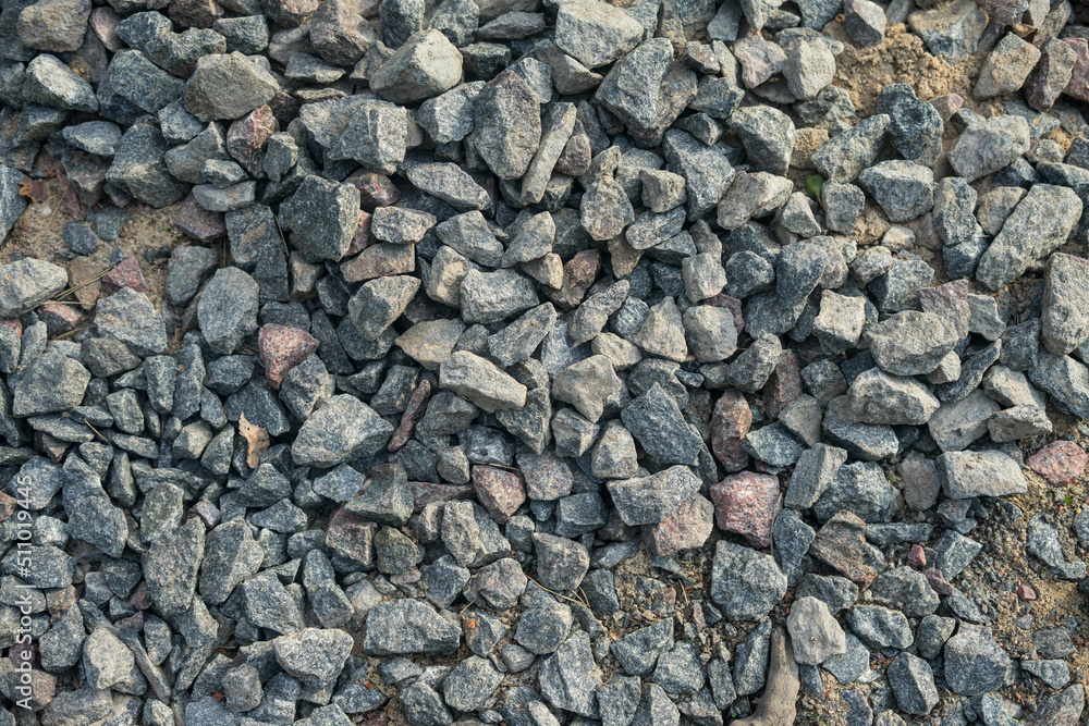Granite gravel of macadam, rock gray crushed for construction on the ground. Granite gravel of macadam, rock gray crushed for construction on the ground.