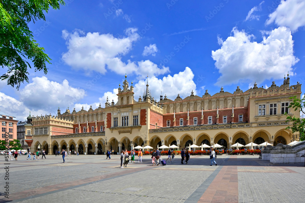 Fototapeta premium Sukiennice buidning with Town Hall in the background, Krakow, Poland