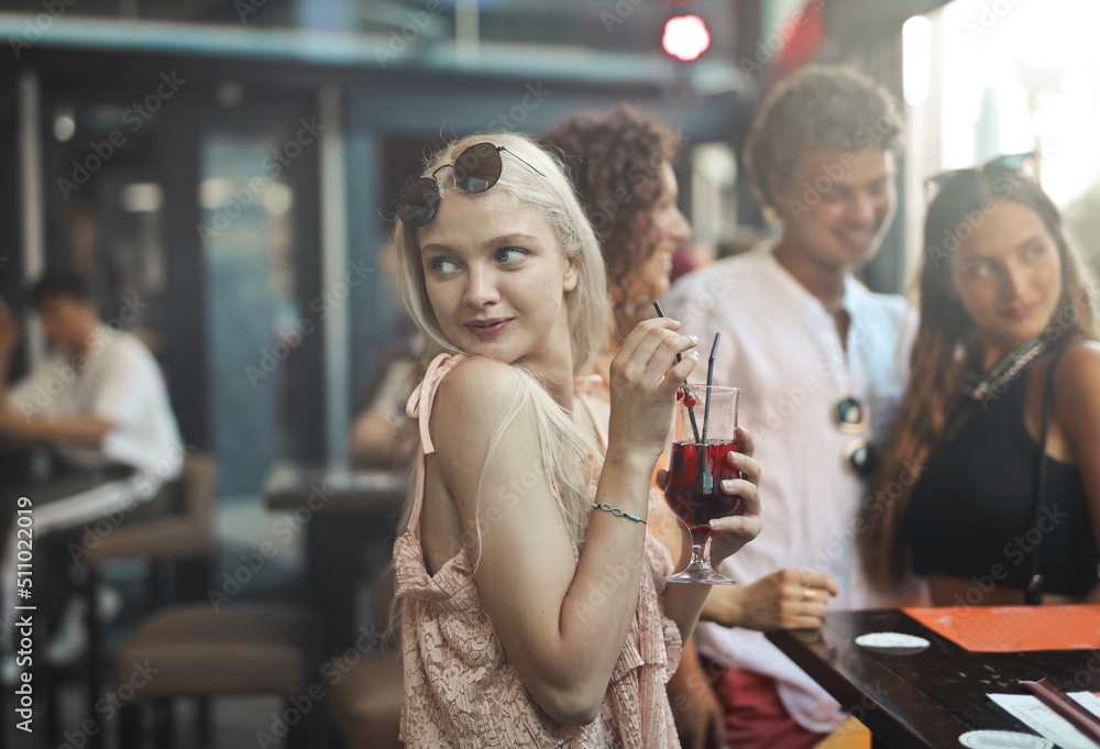 group of young people in a bar group of young people in a bar
