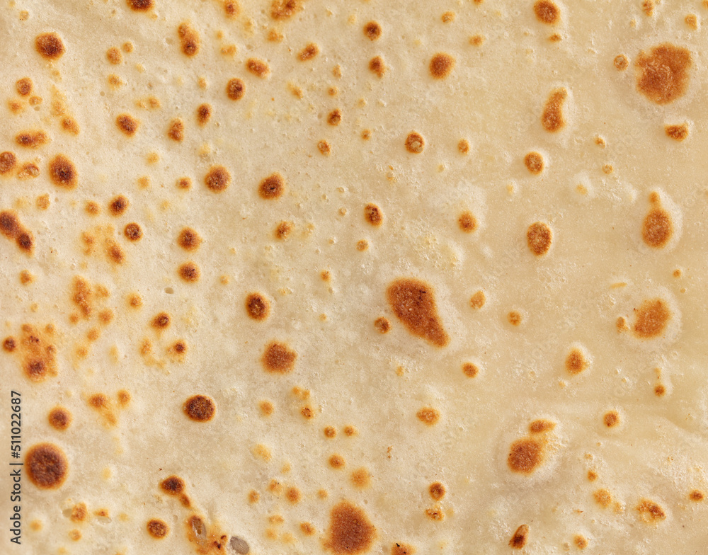 Pan fried pancake as a background. Pan fried pancake as a background.