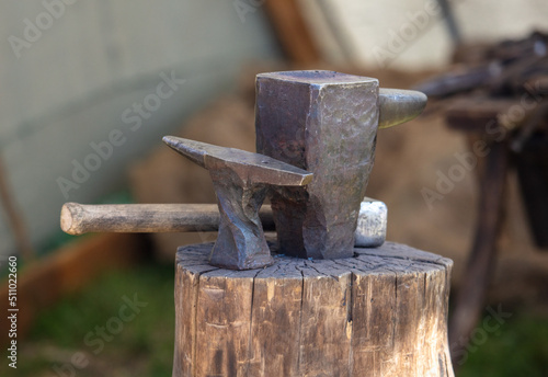 Anvil and hammer. Device for forging metal