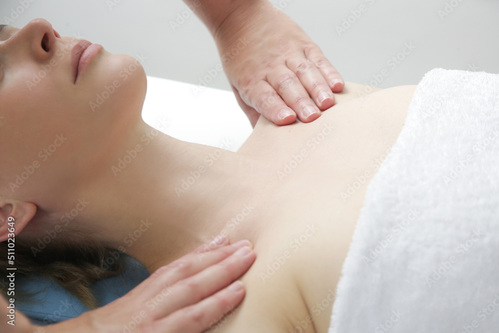 Spa massage outdoor. Mobile massage service. Young woman enjoing soft shooting relax massage experience at open fresh air treatment. Spa massage outdoor. Mobile massage service. Young woman enjoing soft shooting relax massage experience at open fresh air treatment.