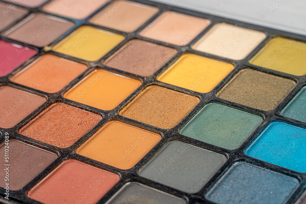 Cosmetic branding, girly concept - Large eyeshadow palette on marble background, eye shadows cosmetics as glamour make-up products for luxury beauty. Cosmetic branding, girly concept - Large eyeshadow palette on marble background, eye shadows cosmetics as glamour make-up products for luxury beauty.