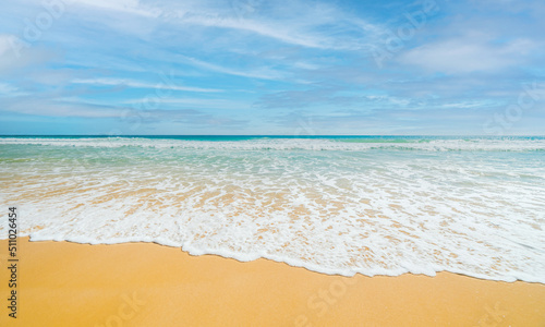 A beautiful seaside sea vacation beach sand sun and wonderful sky.