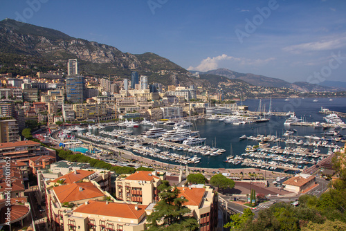 Panoramic aerial view of Monaco and Port Hercule, sweeping views of the city, mountains and harbor, luxury yachts and apartments in La Condamine district, city centre Monte Carlo, Monaco,Cote d'Azur