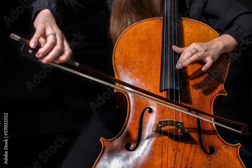 Beautiful girl cellist playing sonata