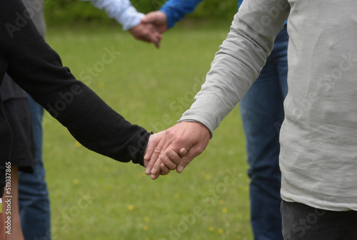 hand holding of couple in a relationship