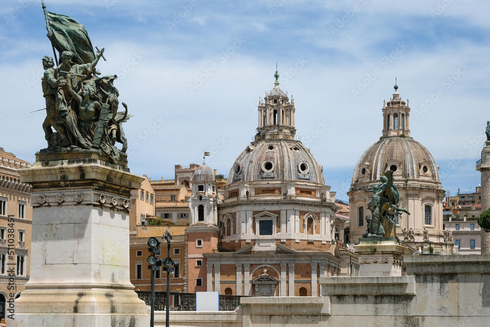 Monument Vittoriano and the majestic domes of Santa Maria di Loreto and Santissima Nome di Maria at Piazza Venezia in Rome, Italy