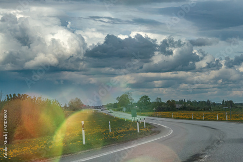 Asphalt twisty suburban road. Travel concept. Summer road