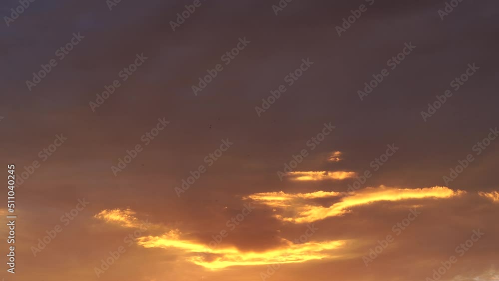 Beautiful evening blue sky at sunset with flaming bright light clouds. A warm summer evening at sunset. Bright sunset.
Beautiful evening blue sky at sunset with flaming bright light clouds. A warm summer evening at sunset. Bright sunset.