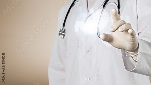 A doctor holding virtual Intestine in hand. Healthcare hospital service concept photo