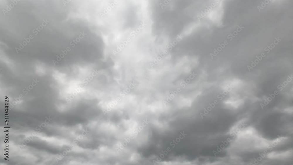 Grey cumulus cloudscape totally covering the sky. Rainy dramatic clouds formation. Timelapse. Grey cumulus cloudscape totally covering the sky. Rainy dramatic clouds formation. Timelapse.