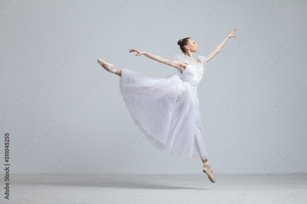 Young Beautiful Female Ballerina Posing on Studio Background - obrazy, fototapety, plakaty 