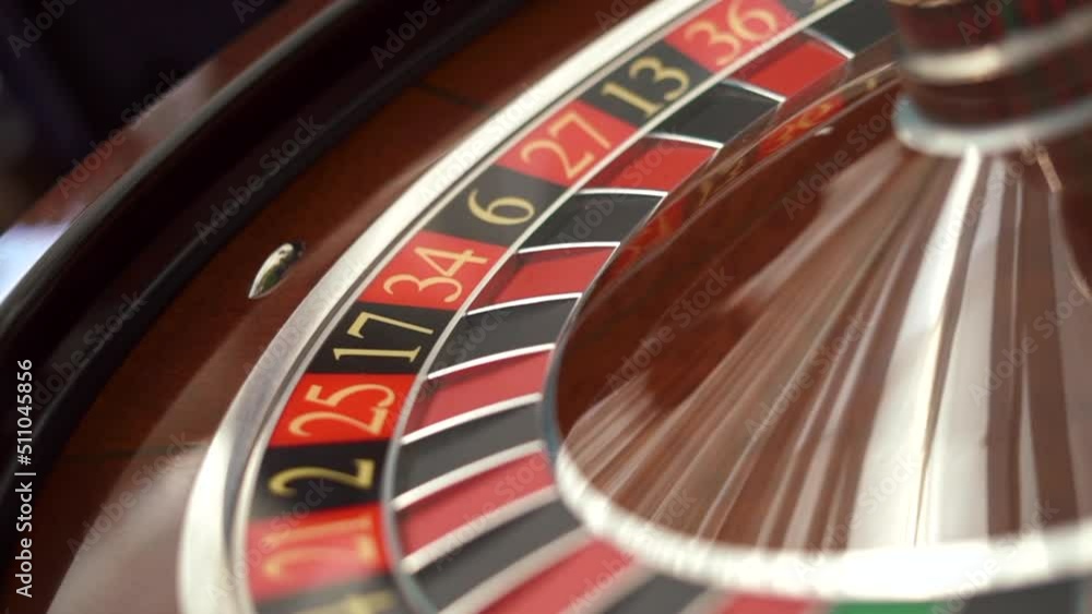 shooting at an angle, The small ball into the slot as the Roulette Wheel spins. High quality FullHD footage shooting at an angle, The small ball into the slot as the Roulette Wheel spins. High quality FullHD footage
