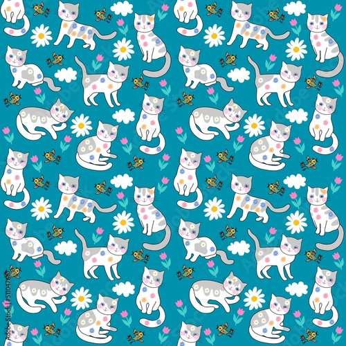 Cute cartoon cats, birds, clouds and flowers on a blue background in vector. Seamless animal print for baby fabric.