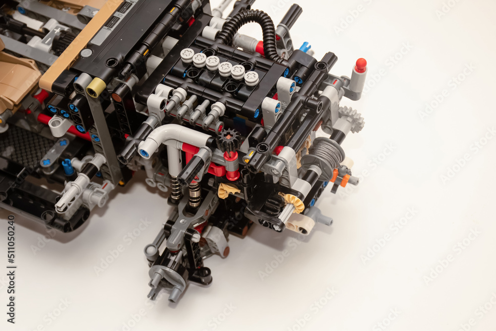 piece of a complex machinery car engine made from plastic construction kit parts pieces piece of a complex machinery car engine made from plastic construction kit parts pieces