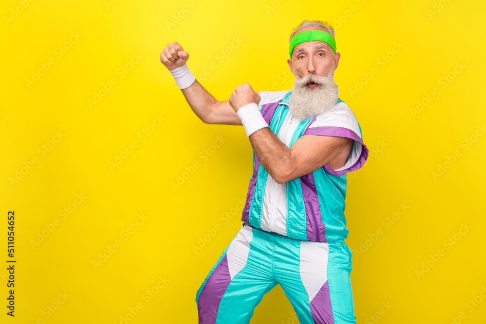 Profile photo of crazy aged person raise fists prepare fight enemy wear condensed milk tin color sport suit isolated on yellow background