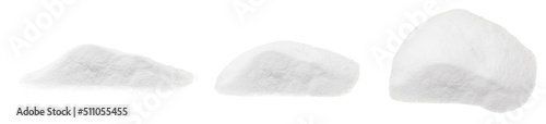 Soda, flour, salt or sugar are poured in heaps. Three heaps of white powder at different angles isolated on a white background. © iKatod