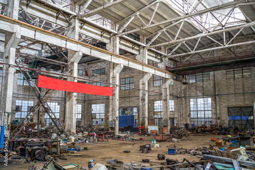 An abandoned steel frame structure automobile production workshop