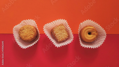 shapes of cookies in stack on red background