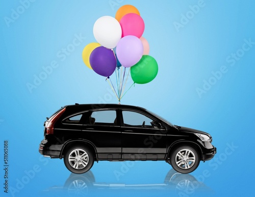 Toy car with balloons. Concept of Independence Day of Israel. photo