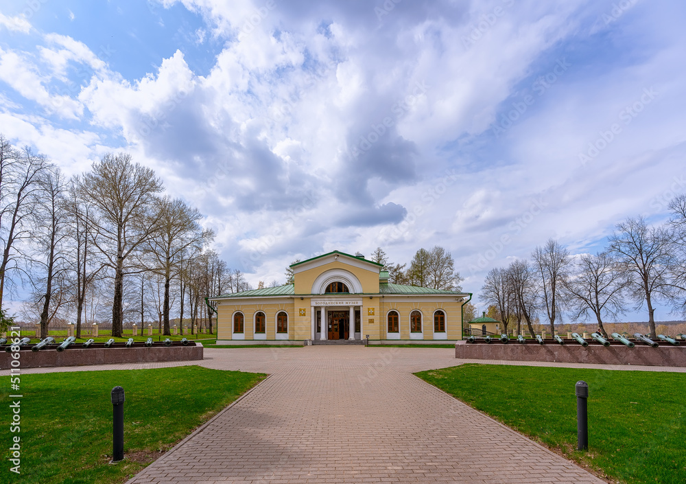 Borodino Museum in the Imperial Park in the village of Borodino against the backdrop of copper cannons