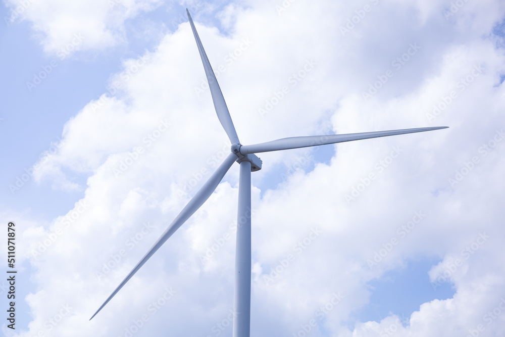 Offshore wind power and energy farm with many wind turbines on the mountain Offshore wind power and energy farm with many wind turbines on the mountain