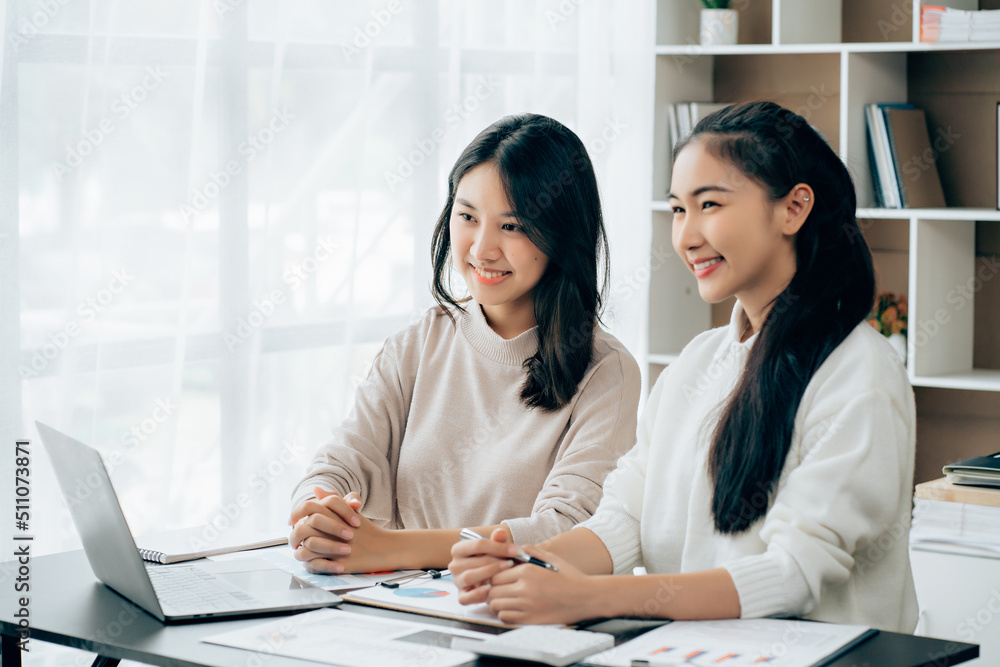 Asian businesswoman shaking hands to congratulate success. Asian businesswoman shaking hands to congratulate success.