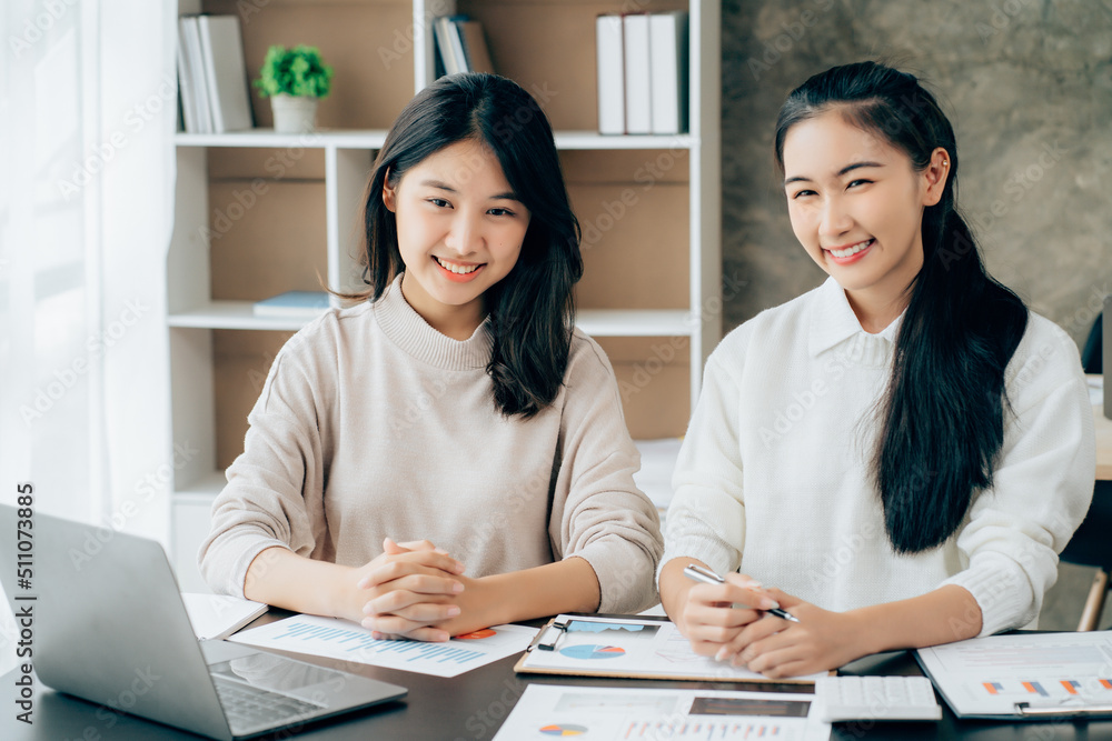 Asian businesswoman shaking hands to congratulate success. Asian businesswoman shaking hands to congratulate success.