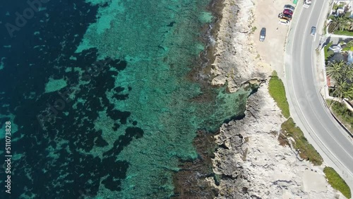 Aerial views from Moraira's coast. Drone video in Moraira, White Coast, Alicante, Spain. Les platgetes, Moraira.  photo