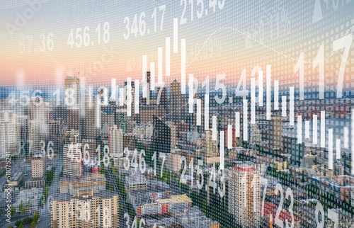 Abstract virtual financial graph hologram on blurry city background, financial and trading concept.