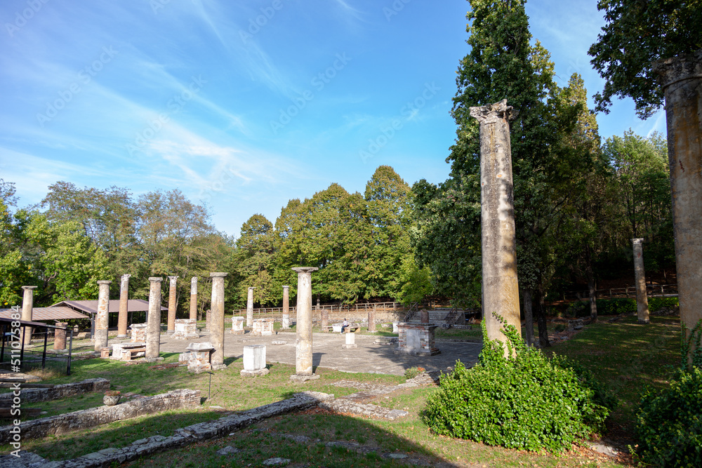 ruins of an ancient Roman city with columns in an Italian archaeological site