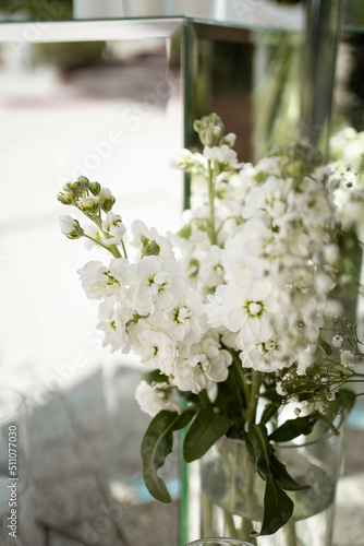 Close up of wedding decorations, with white fresh flowers. Tender wedding arrangements. © Mihai
