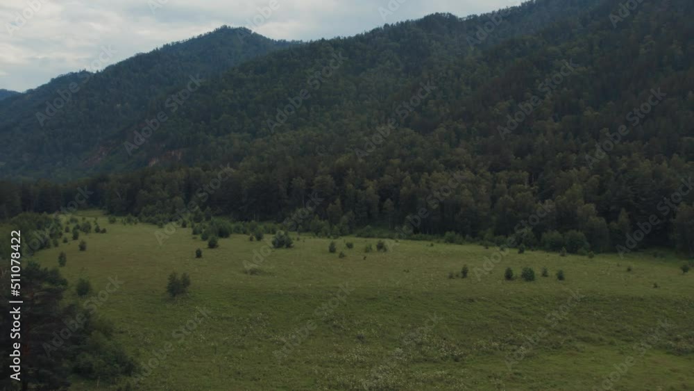 Mountains of Altai at during daytime, Altai, Siberia, Russia. Beautiful summer nature landscape at during daytime. Aerial view from a drone Mountains of Altai at during daytime, Altai, Siberia, Russia. Beautiful summer nature landscape at during daytime. Aerial view from a drone