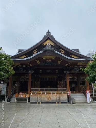 The main pagoda of Yushima Tenjin, the historic establishment in 458 the beautiful architecture with plum symbolic family crest “Kamon”.  Photo taken year 2022 June 15th © KAYO SUGIUCHI